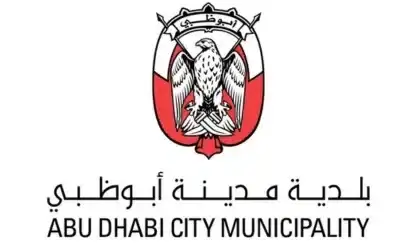 Abu Dhabi City Municipality official logo with Arabic text and falcon coat of arms